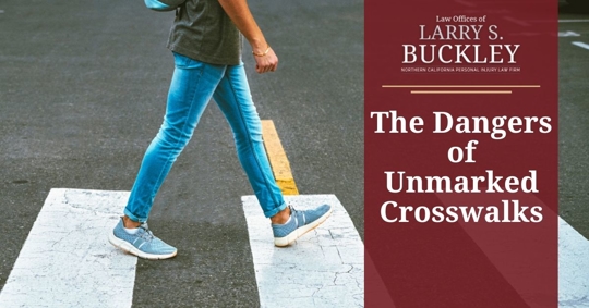 Woman walking across the street in a designated crosswalk