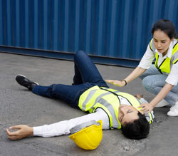 Coworker trying to help an injured colleague